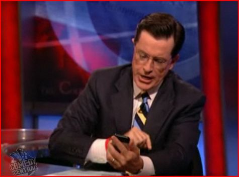 Stephen Colbert holds iPhone upside down