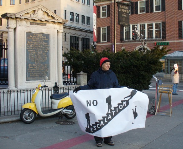 Protester with 'No Escalation' sign at Park Street Jan 11,2007.