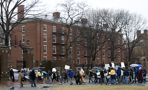 Harvard Anti-War Coalition passing Holworthy Hall on the way to the Statue of the Three Lies.